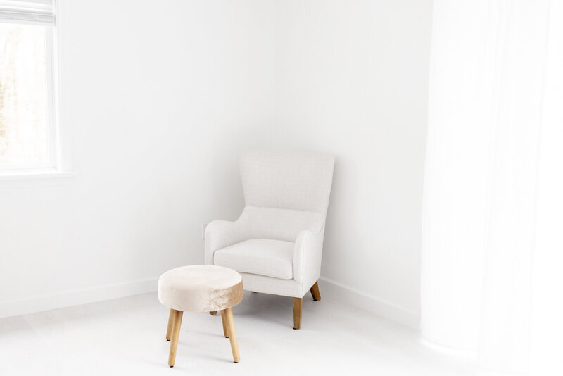 chair and ottoman in photography studio