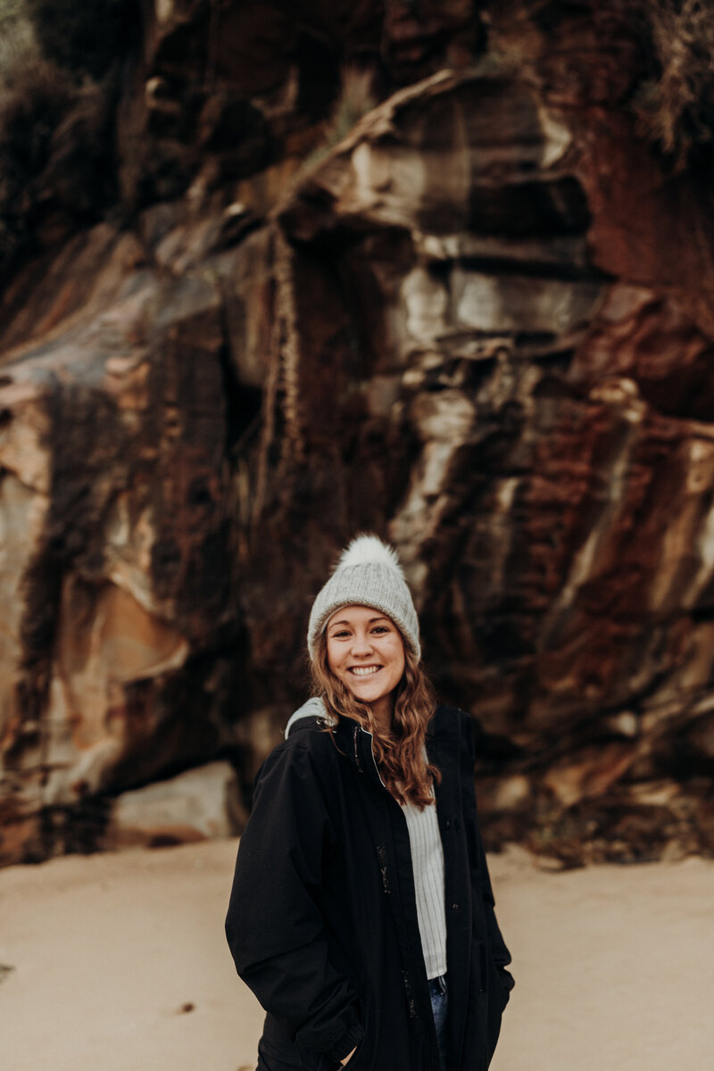 Portrait of woman smiling at Little Bay Beach, Sydney