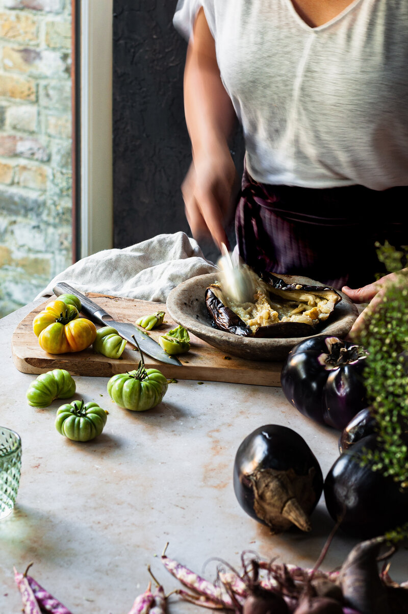 aubergine-prep-taco-process-blurry-nands-in shot