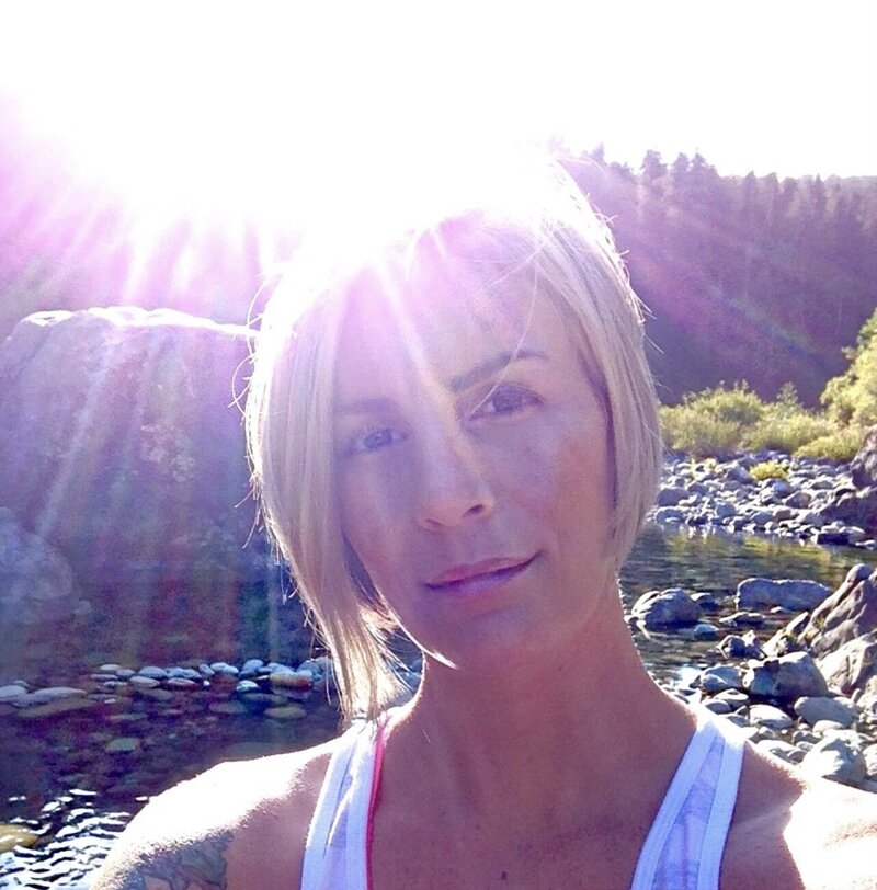 Woman outside in sunlight