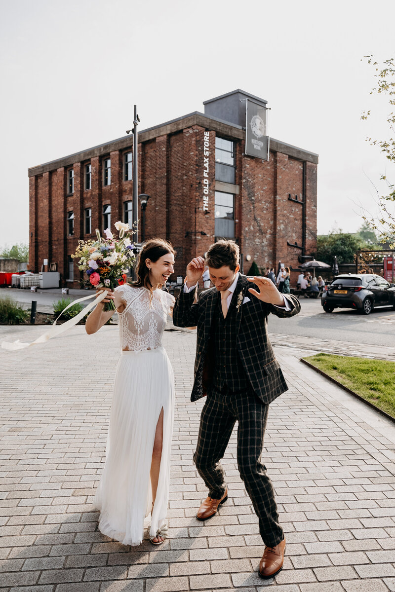 Bride and Groom outside The Chapter Hall in Leeds