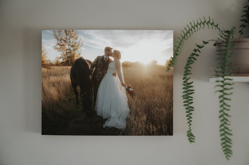 A mockup of a brideand groom's wedding image on a canvas.