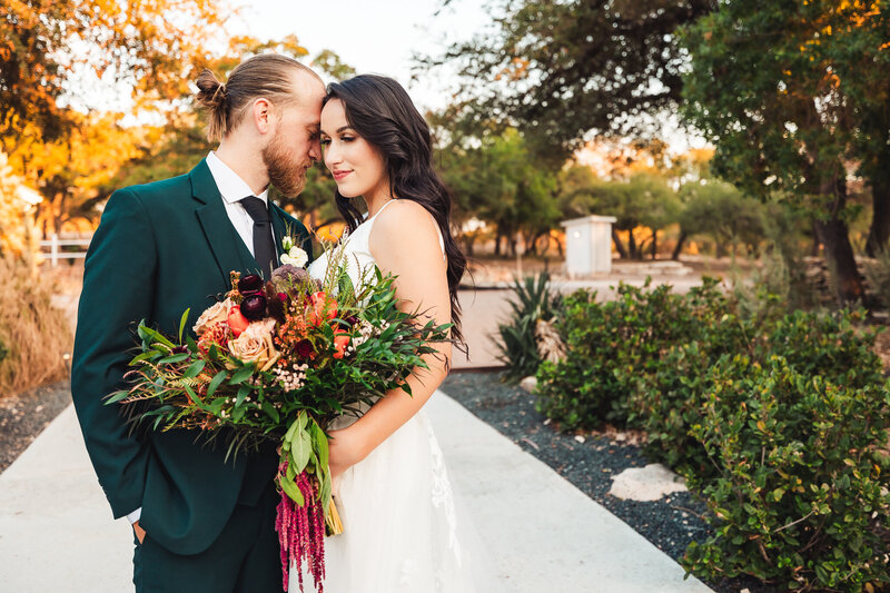 Elevate your wedding with bold colors and relaxed vibes at your destination Texas wedding. Jewel-tone dresses, lavish florals, and endless joy await!