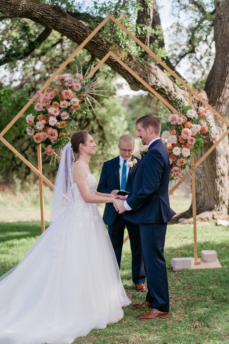 hill-country-couple-at-ceremony-vows