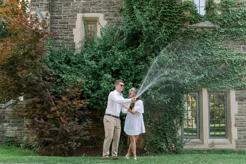 Couple's photo, she is looking at the camera and he is looking into her