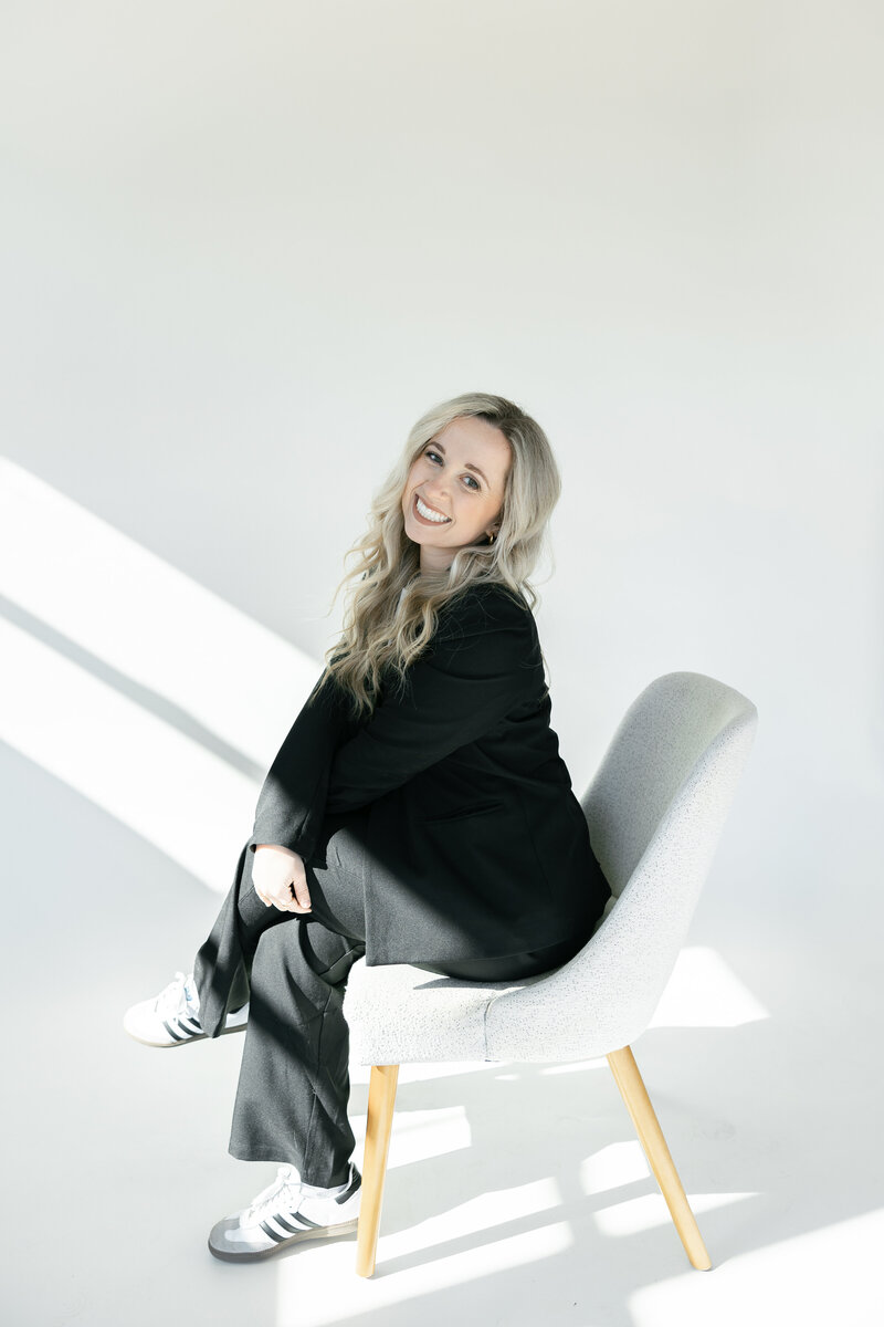 black and white photo of north carolina photographer in studio