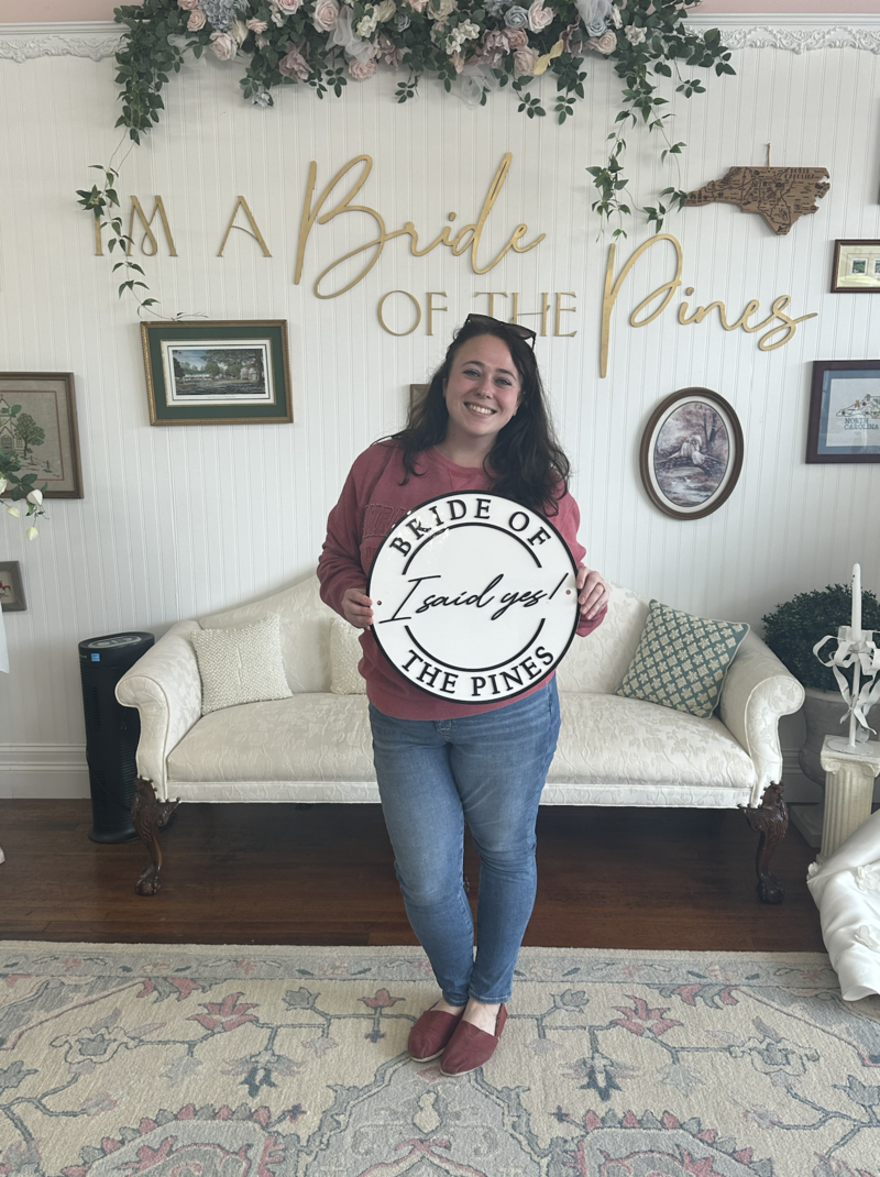 bride with I said yes sign