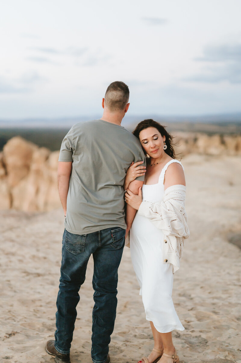 couple loving on each other during their engagement session