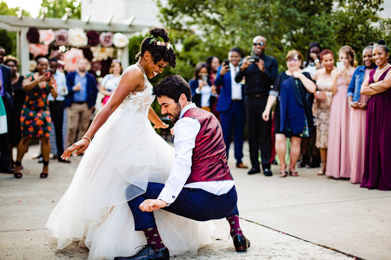 A wedding couple dancing outside for their first dance in Detroit Michigan