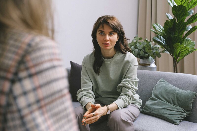 Girl looking pensive in therapy