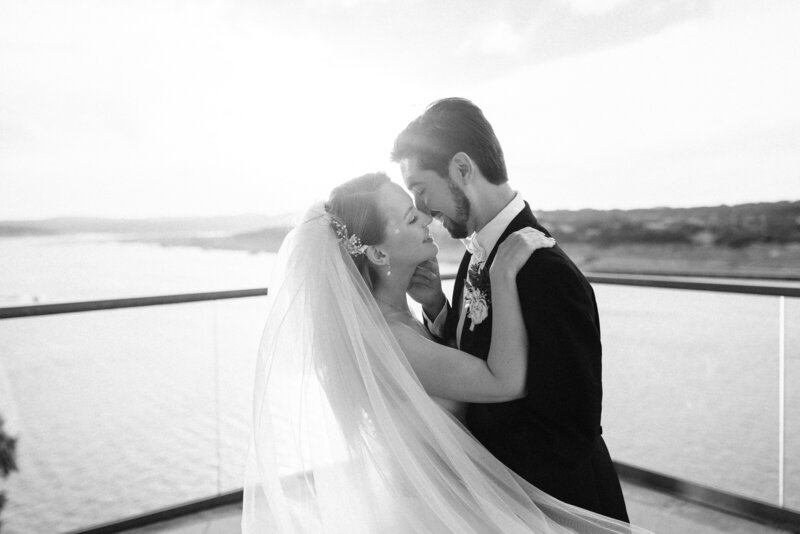 bride and groom about to kiss