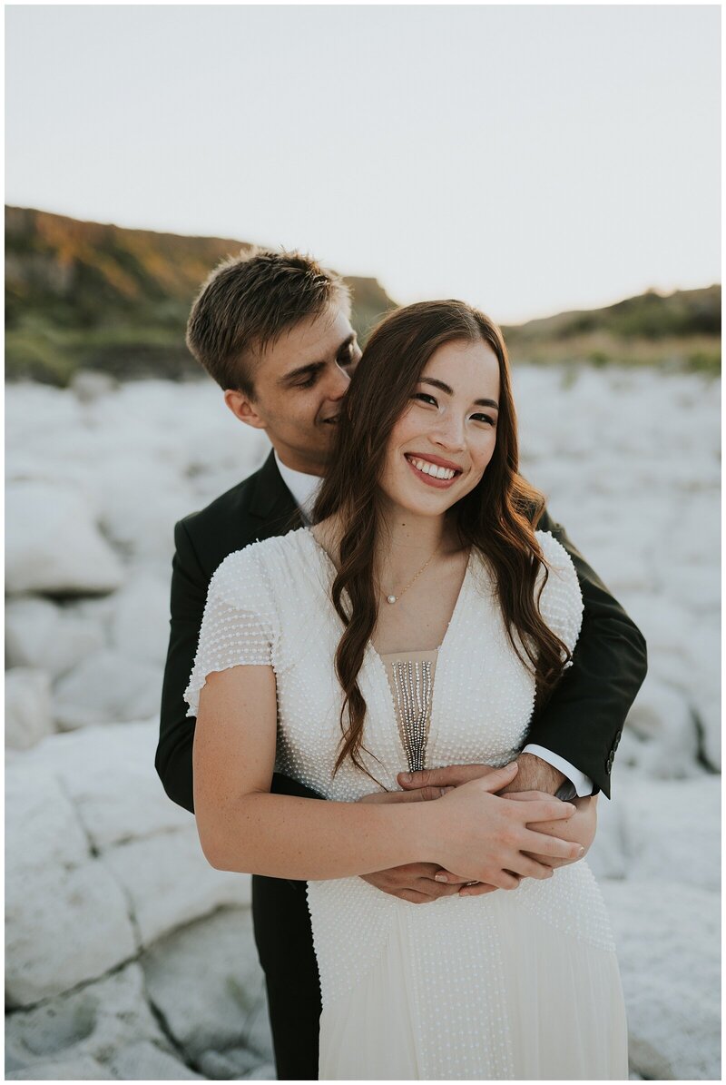 Boise Wedding Photographer | couple walking hand in hand in the snake river in boise  idaho