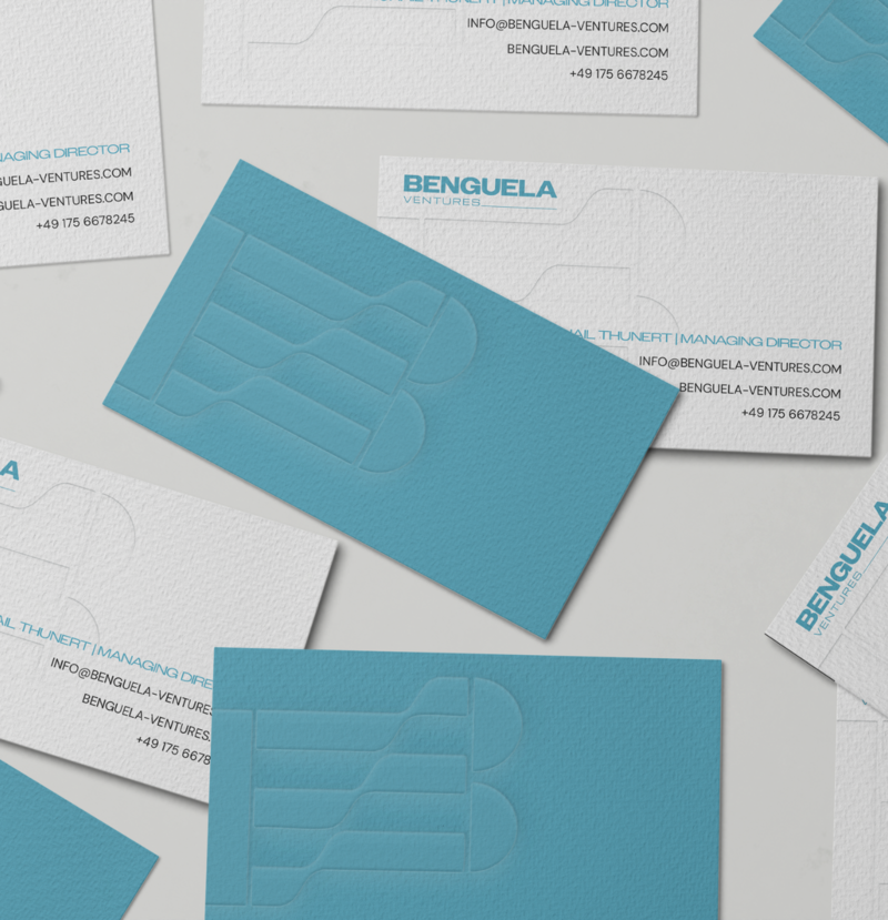 Business cards of a real estate firm with logo and branding