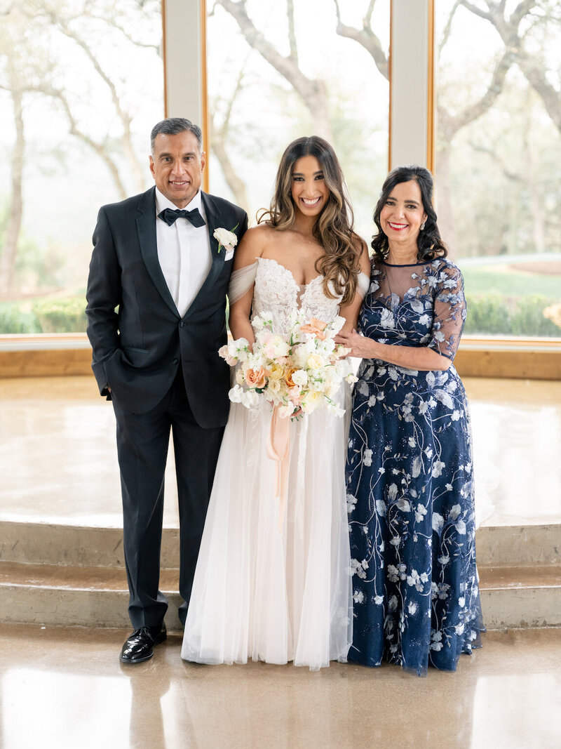 Family portraits at Canyonwood Ridge with Hill Country backdrop