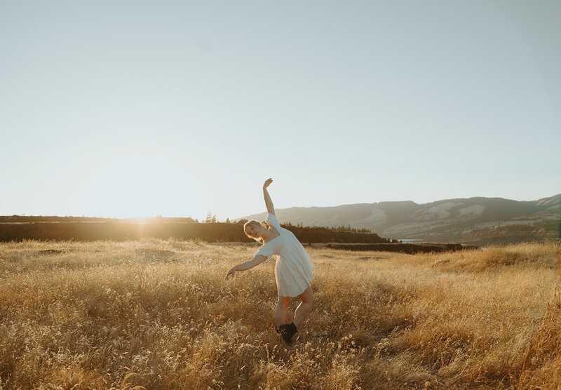 girl dancing in field