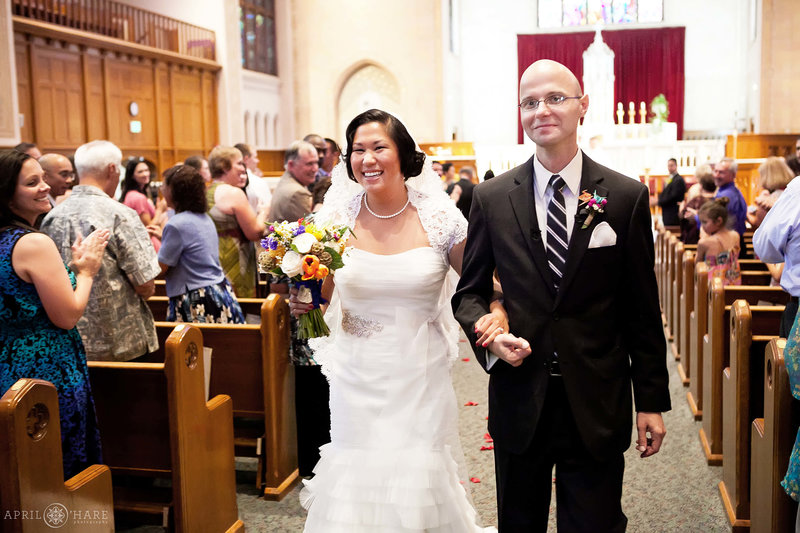 Happy-Wedding-Ceremony-at-Saint-Ignatius-Loyola-Catholic-Church-in-Denver