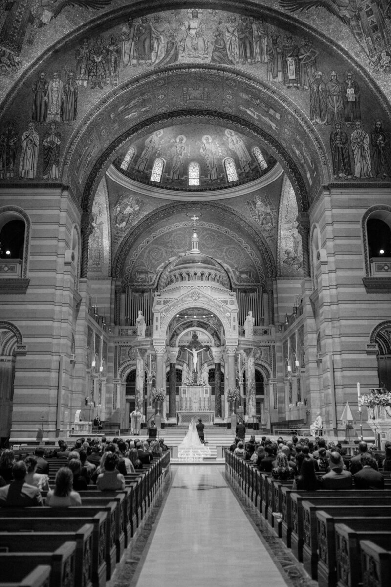Bride gracefully stepping down stairs