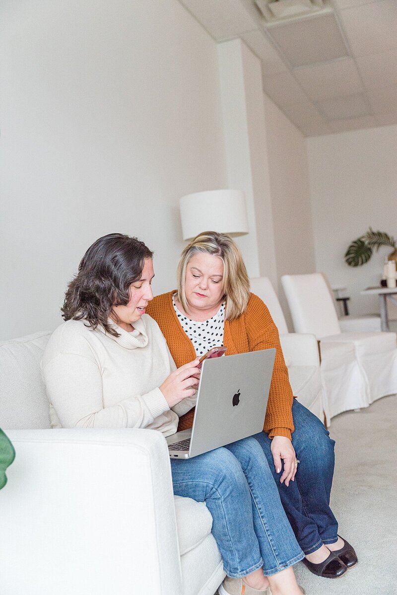 Renee helping another photographer with social media