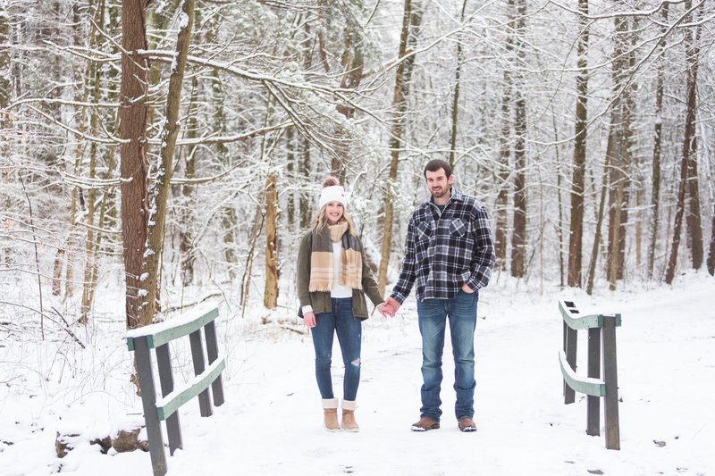 snowy engagement photos at quail hollow state park in hartville ohio photographed by Jamie Lynette Photography  Canton Ohio Wedding and Senior Photographer