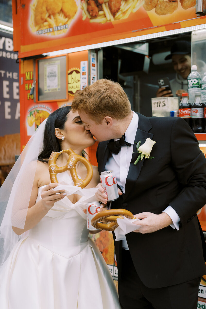 Bride wearing a veil in the city