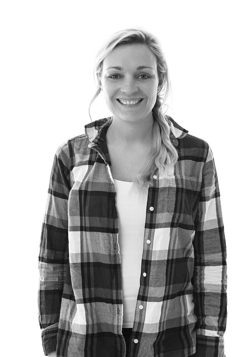 Before shot of a woman  smiling warmly at the camera.