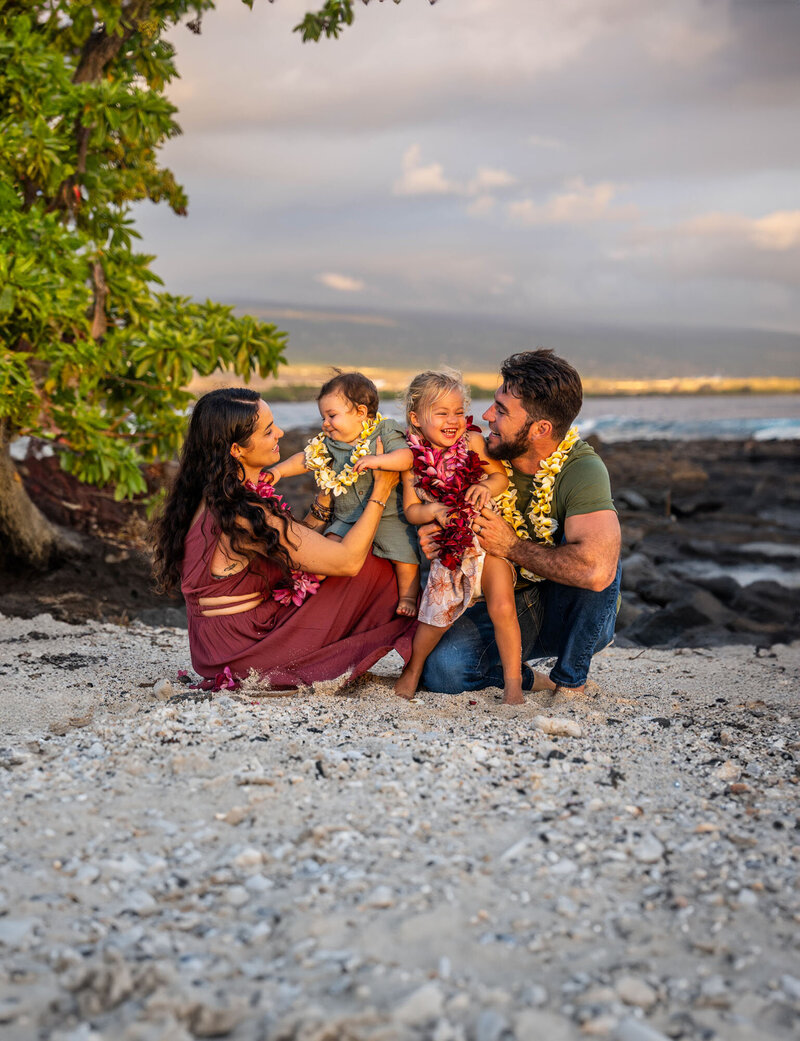 Family photos with young kids and parents on the beach, taken by Big Island photographer, Hawaii Adventure Portraits