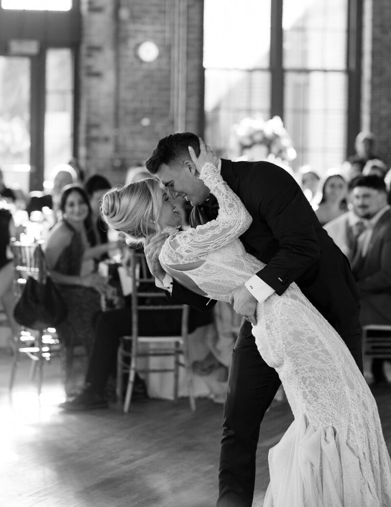 Bride and groom sharing a joyful moment in historic Charleston, South Carolina.