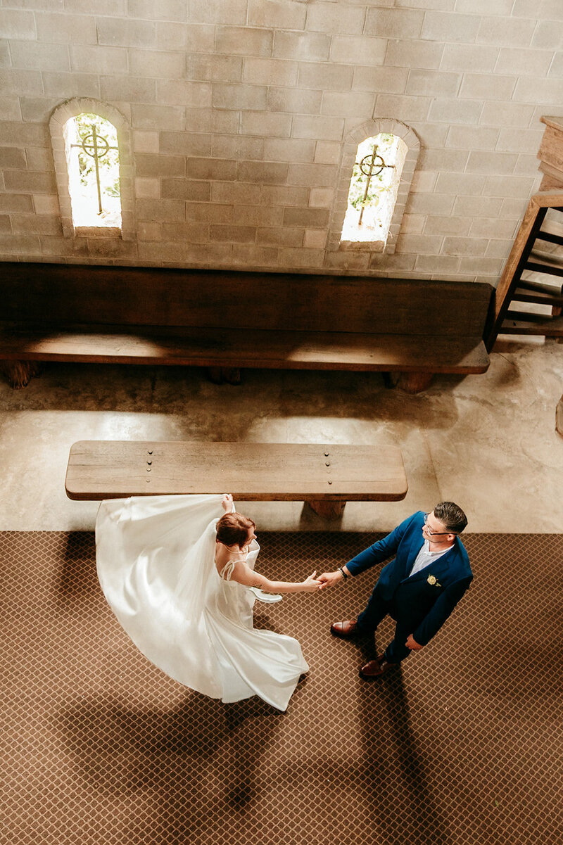 Bride and groom dancing together at their wedding reception in Jacksonville, Florida.