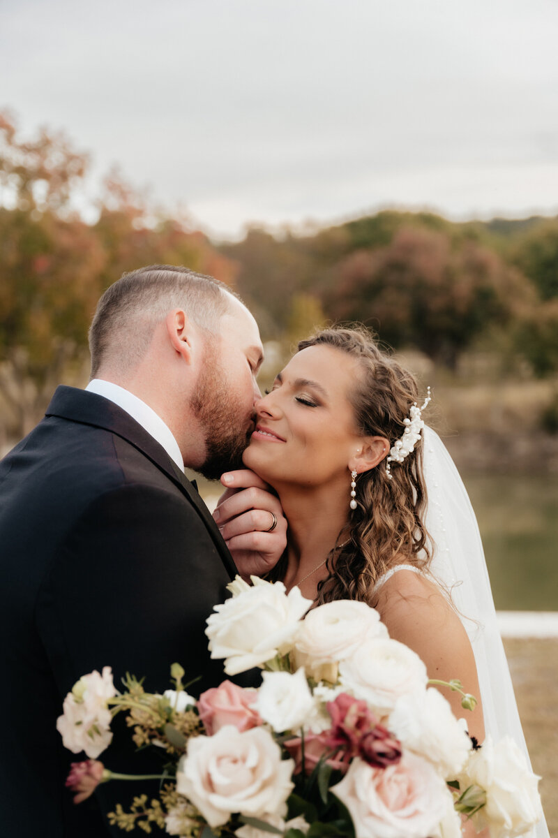 bride and groom kissing