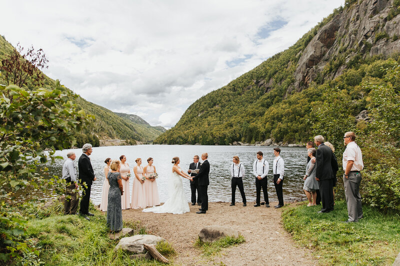 wedding ceremony on the beach of a lake