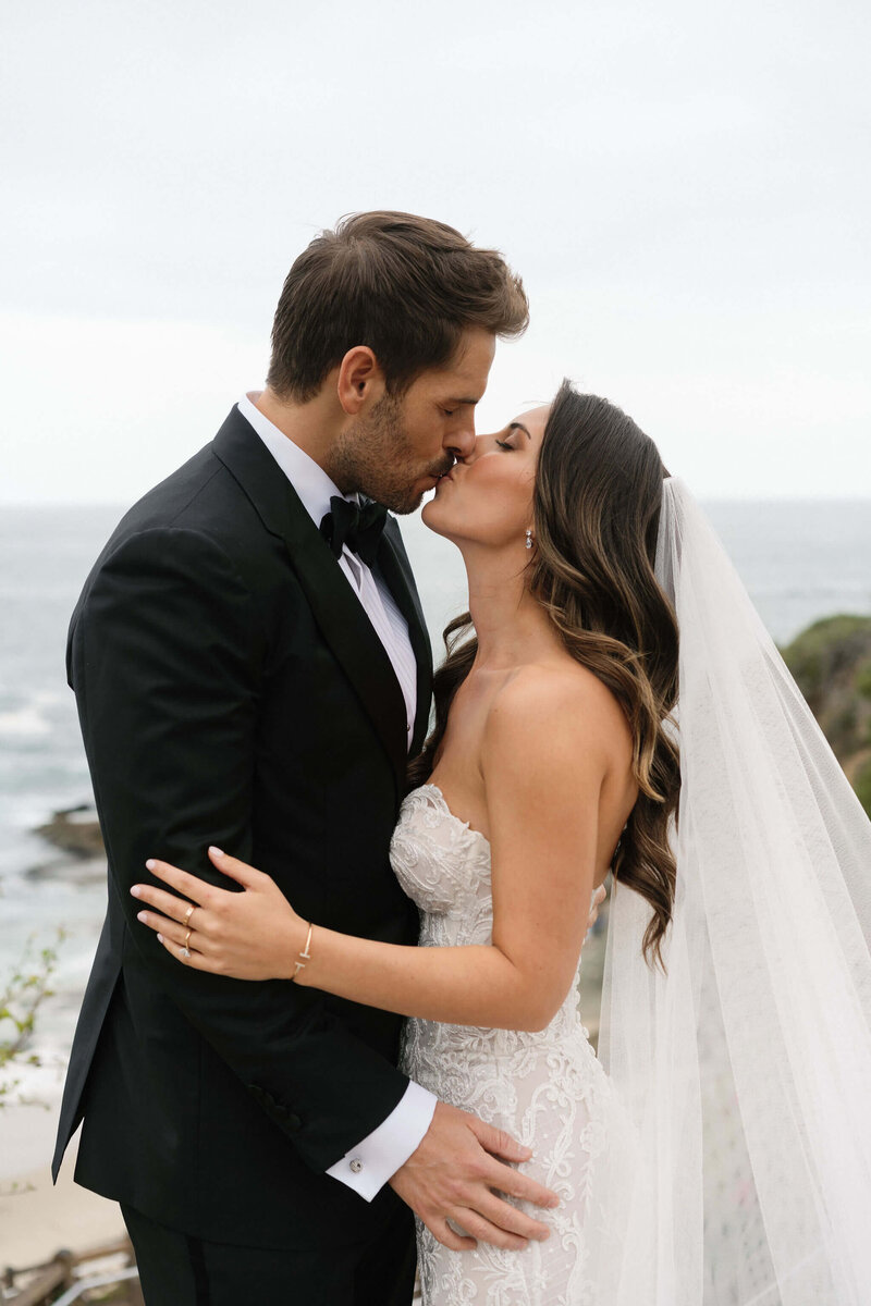 Bride and groom kissing