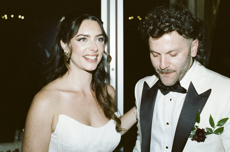 Happy couple after their cake cutting at Boscobel House & Gardens in the Hudson Valley shot on 35mm film