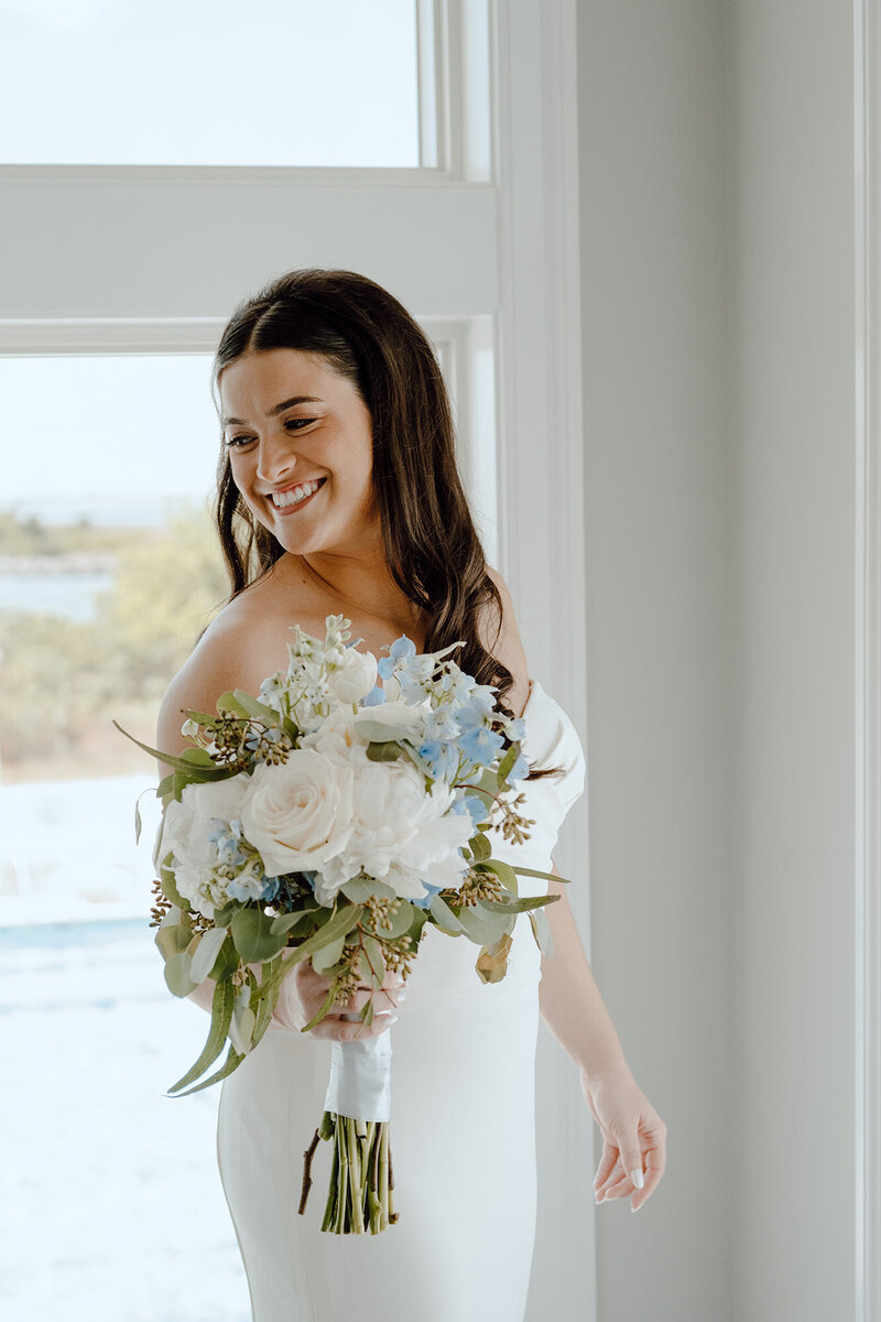 Bride looking over her shoulder smiling