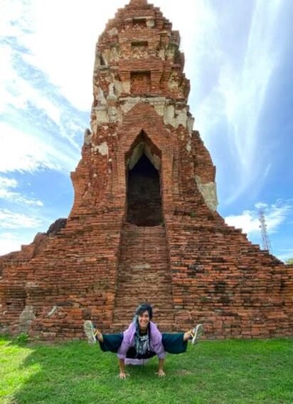 Lis Tello, a yoga teacher in Sayulita, guiding students at all levels to build self-confidence through personalized yoga, meditation workshops, retreats, surf lessons, and Monkey Mountain hikes.