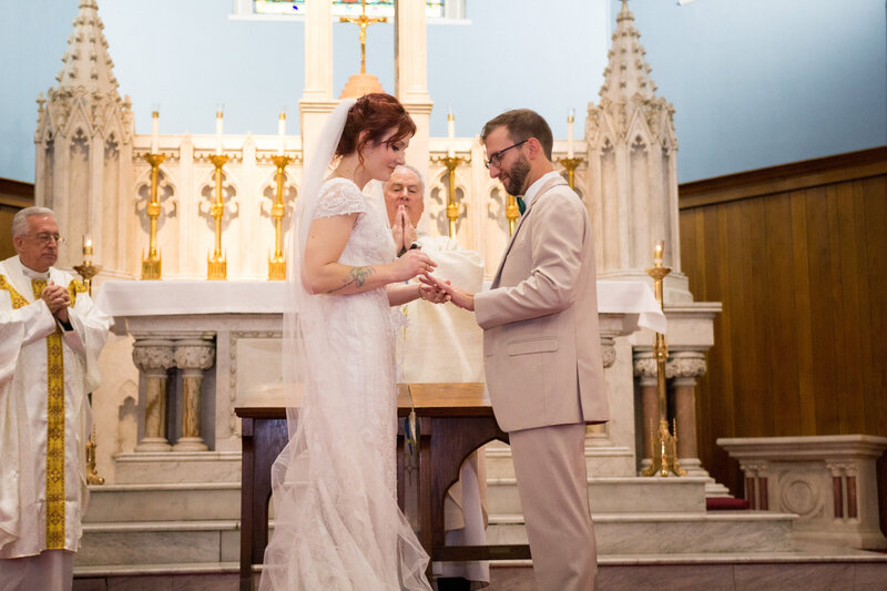 bride and groom in catholic church