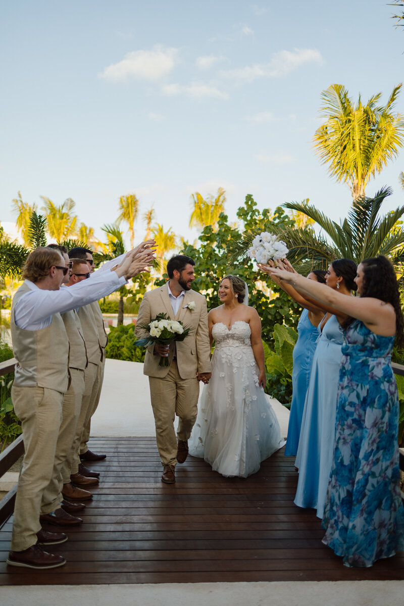 Couple kissing under sparklers at destination wedding in Mexico