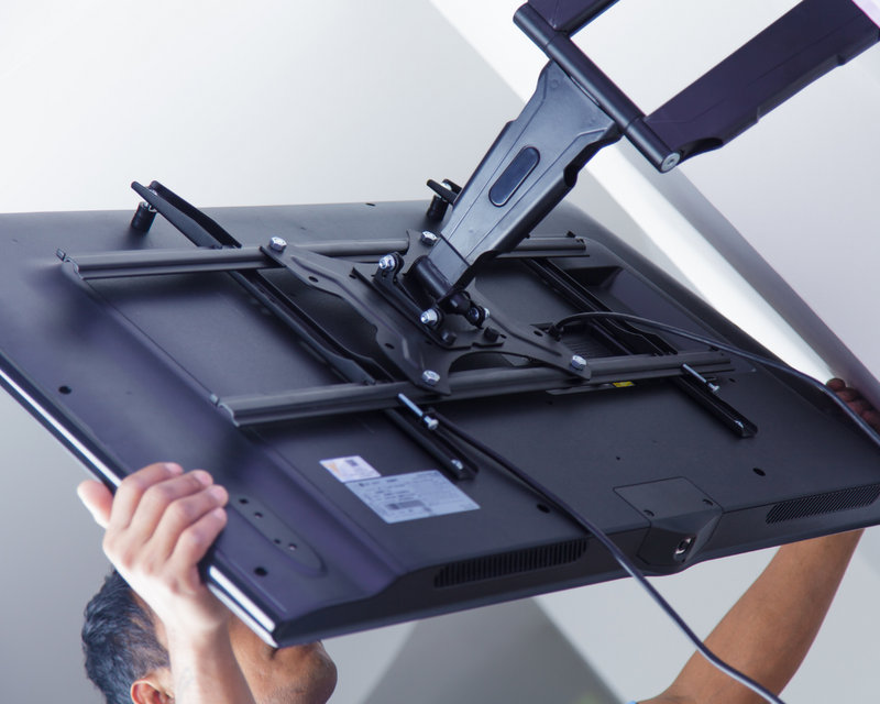 Nate from Nate’s Handyman Co. repairing a wood deck for a homeowner in the Upstate SC. Image shows professional deck repair work including replacing damaged deck boards and reinforcing the structure. Reliable deck repair and deck building services available in Greenville, Travelers Rest, Greer, Taylors, and surrounding Upstate areas