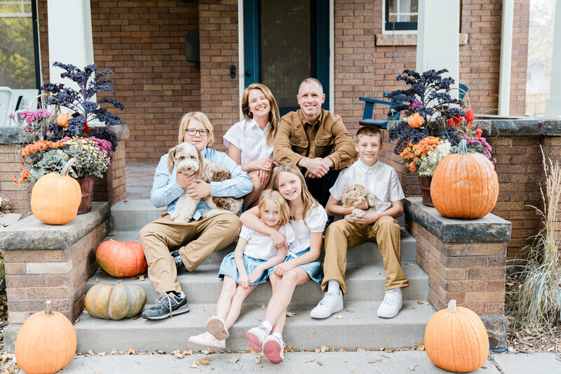 Family walking together in wooded Minneapolis