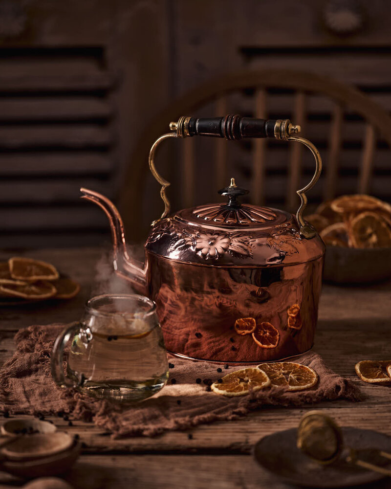 Coppermill Kitchen | Antique English Tea Kettle w/ Embossed Lid against moody background