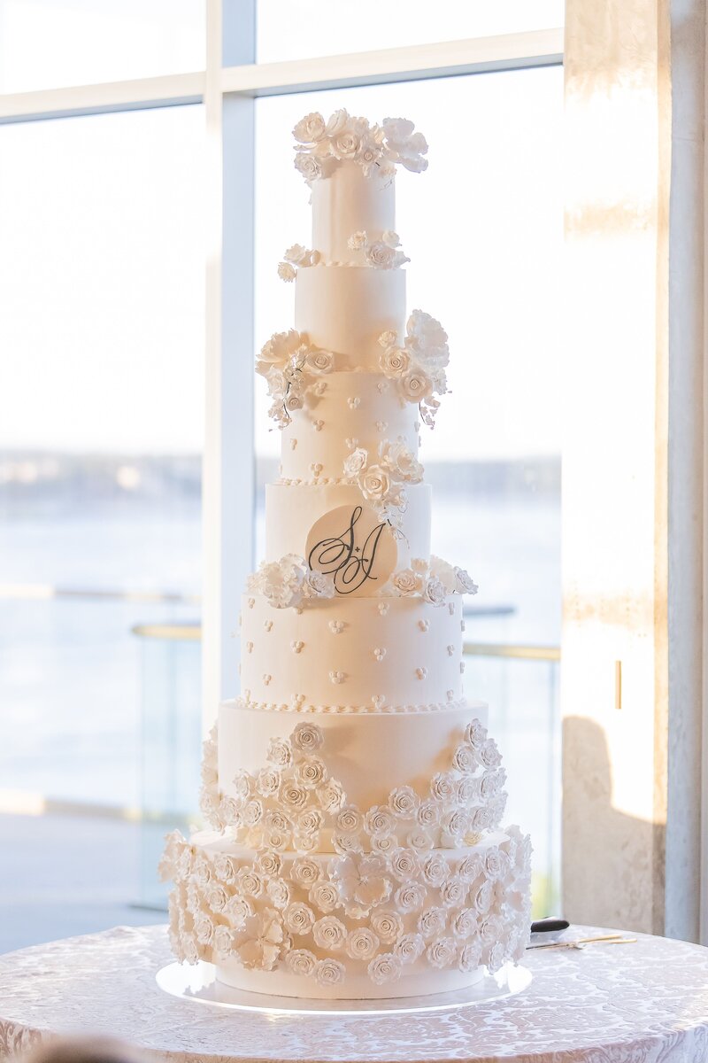 7 tier wedding cake at reception planned by Bianca Nichole and Co