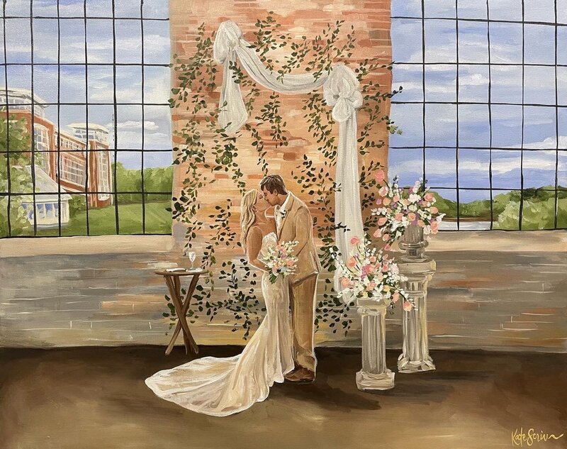 fine artist with bride and live wedding painting