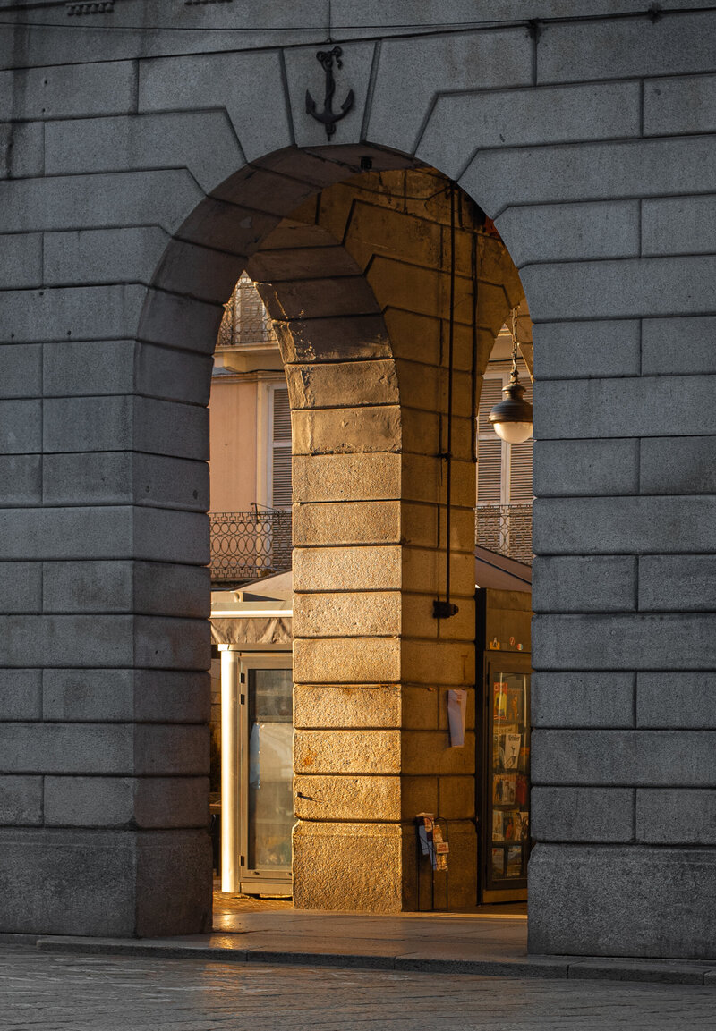 brick arches with the sunlight coming through 