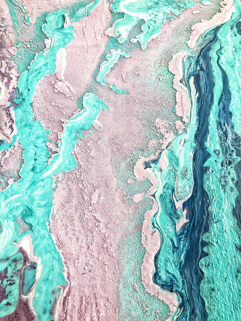 Collection of fluid art pieces featuring marbled textures and rich, swirling colors inspired by natural elements