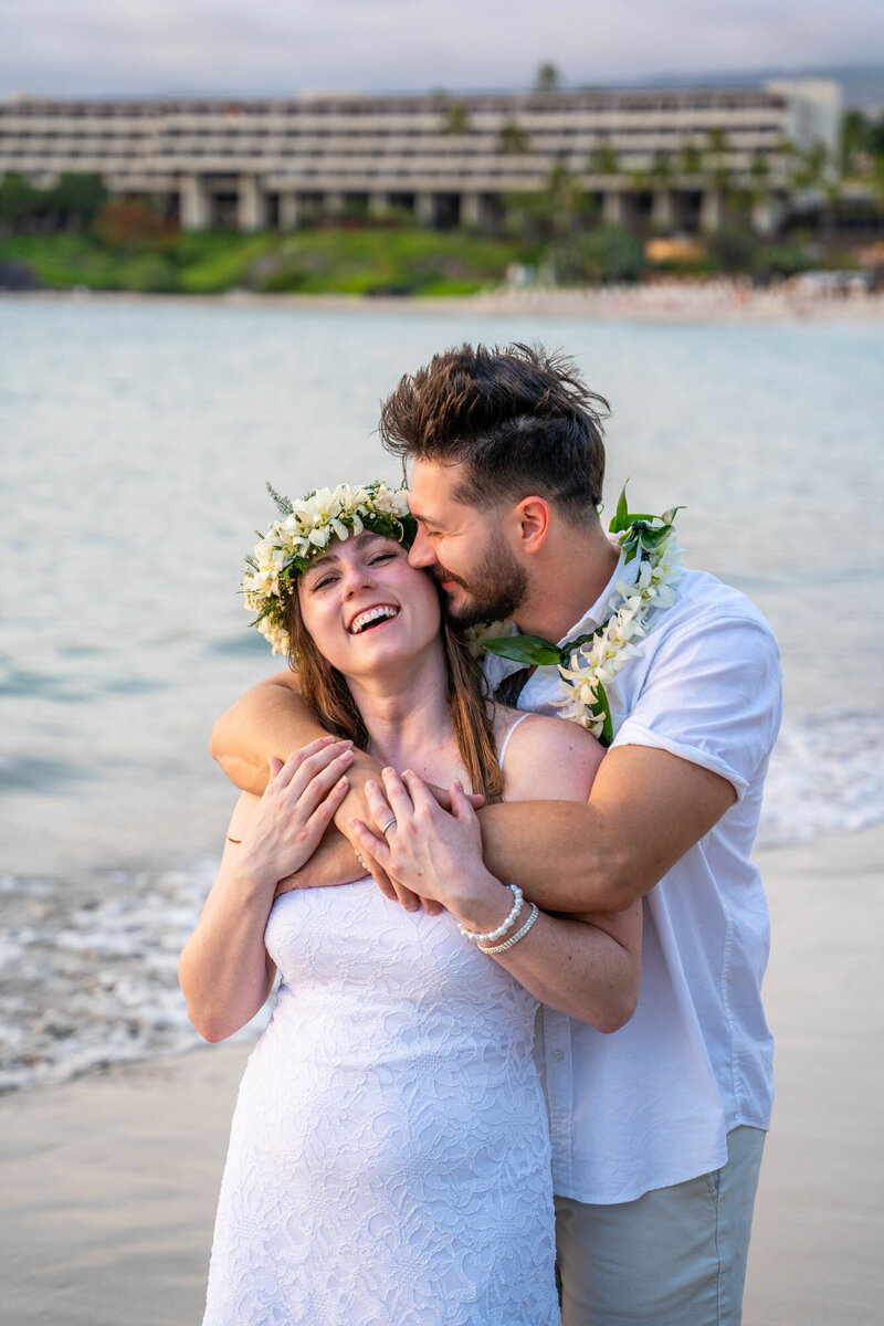 Couple on beach, by photographer on the big island of hawaii