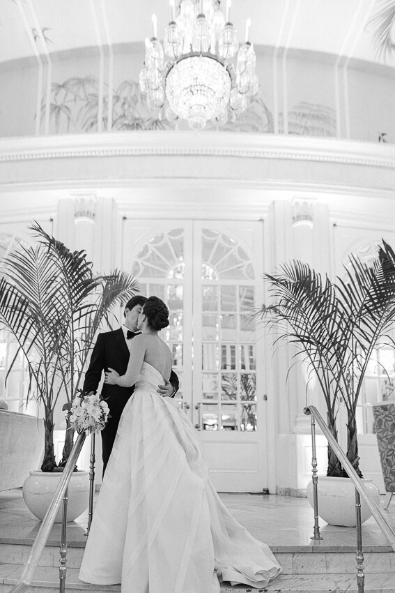 A couple kissing at The Ritz Carlton