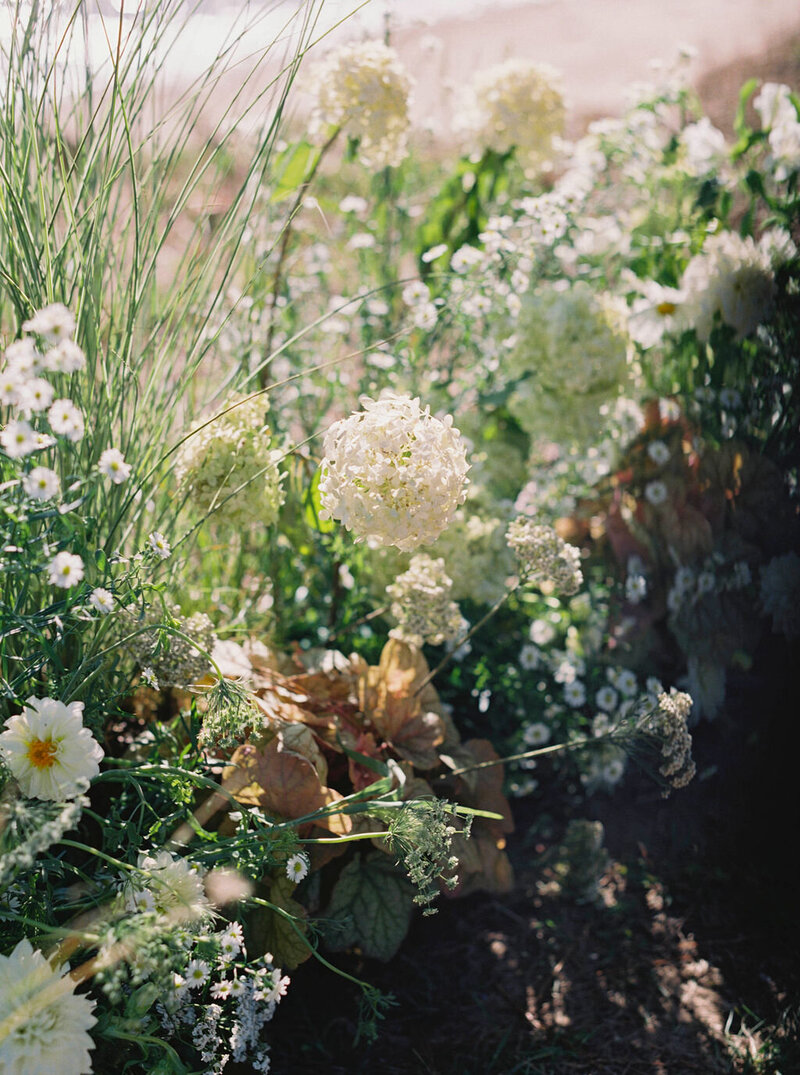 87Kate Campbell Floral Brittland waterfront tented wedding by Molly McManus photo