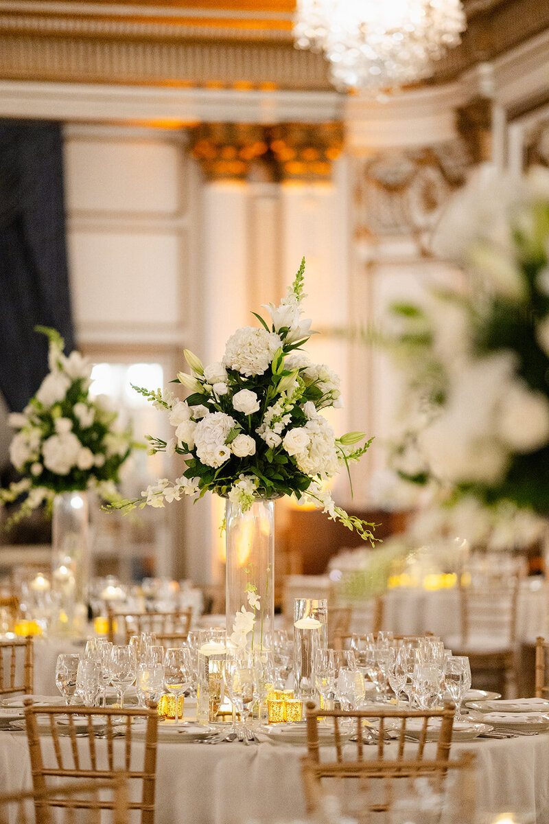 Tall white floral centerpieces in Fairmont Copley ballroom in Boston, MA