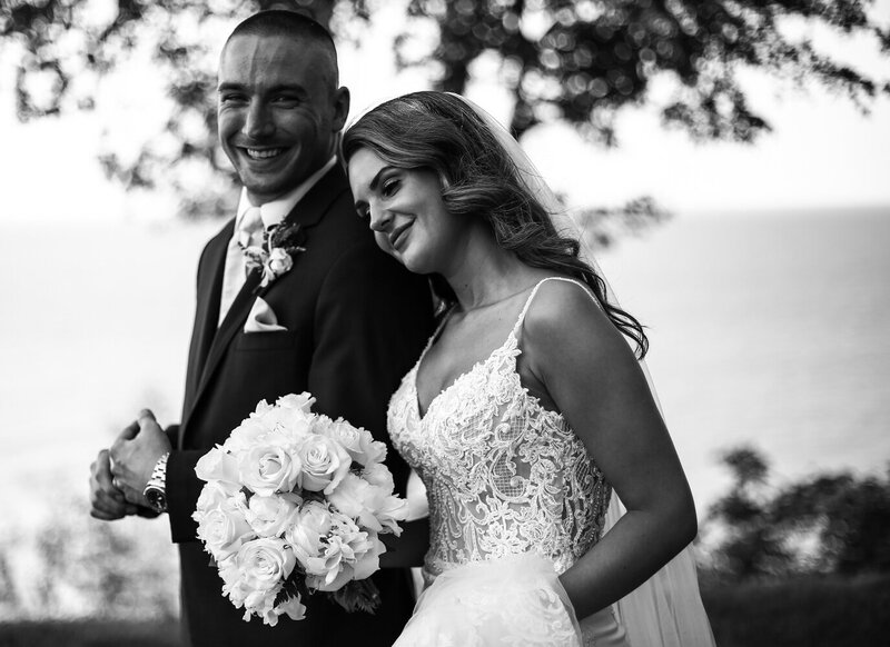 Smiling couple at Lakeshore Country Club wedding