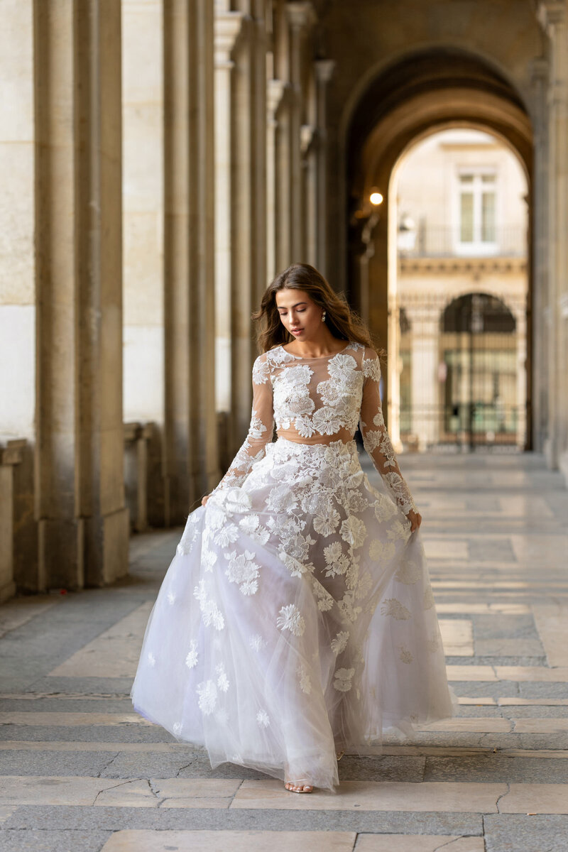 beautiful bride walking through The Louvre, Paris  France