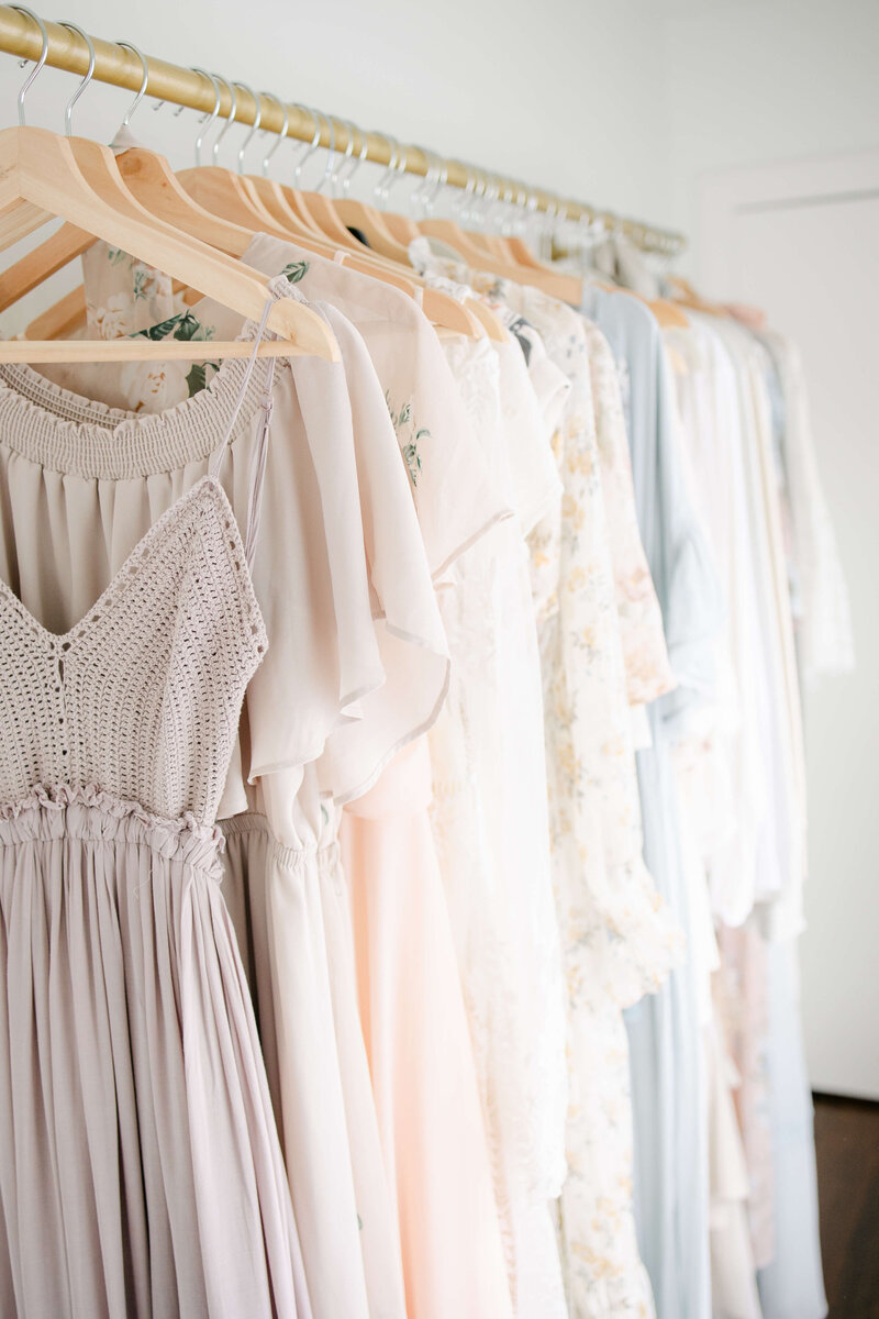 dresses hanging up in a client closet